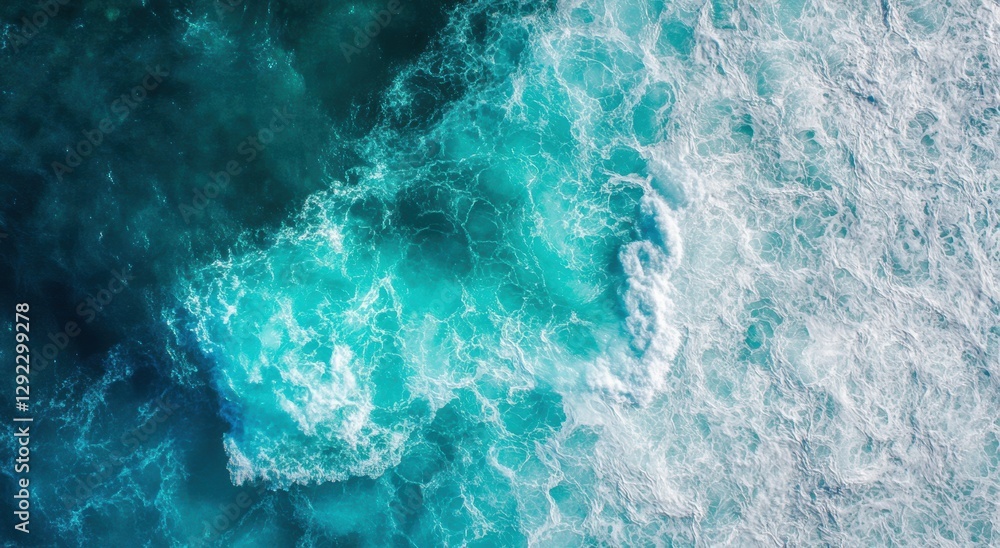 Fototapeta premium Serene Aerial View of Turquoise Ocean Waves and White Foam Patterns