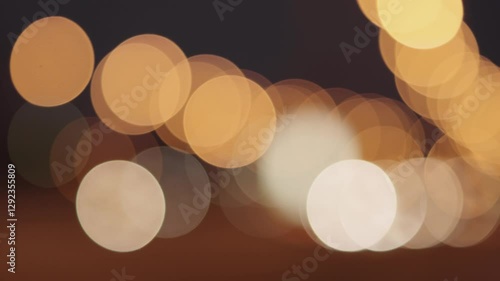 Bokeh Lights Of City Traffic At Night, Featuring Blurred Headlights And Taillights Creating A Colorful Urban Scene, Capturing The Essence Of Nocturnal City Life.