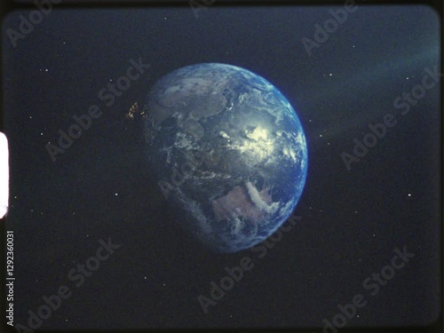 Earth in space old super 8 film retro style, 1960's