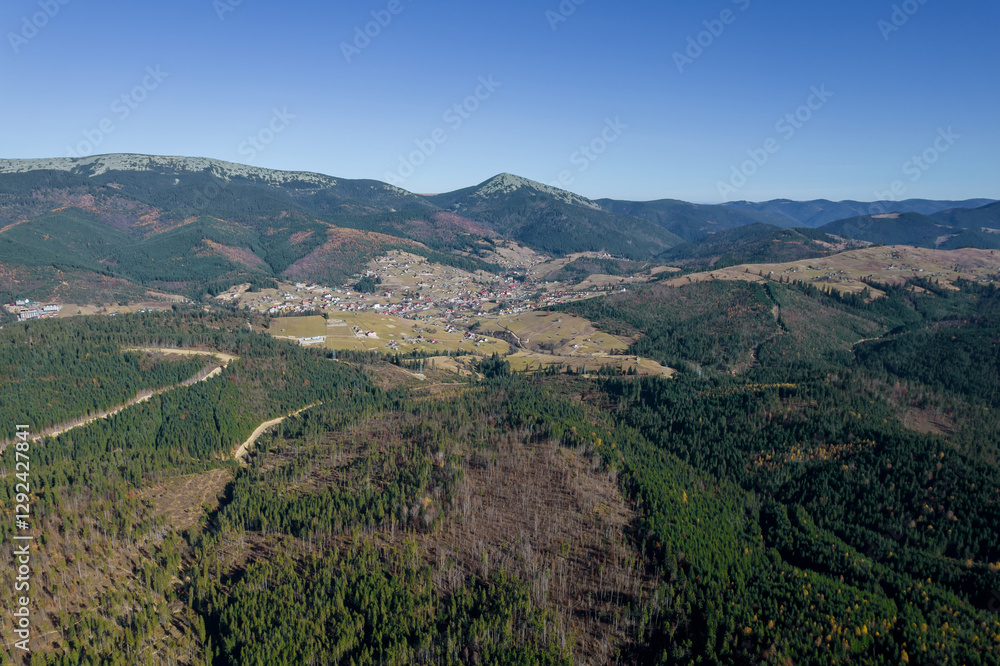 Fototapeta premium Beauty of nature is truly captivating, especially when you witness autumn mountains. If you seek relaxation in the midst of nature, a mountain retreat is the perfect choice.