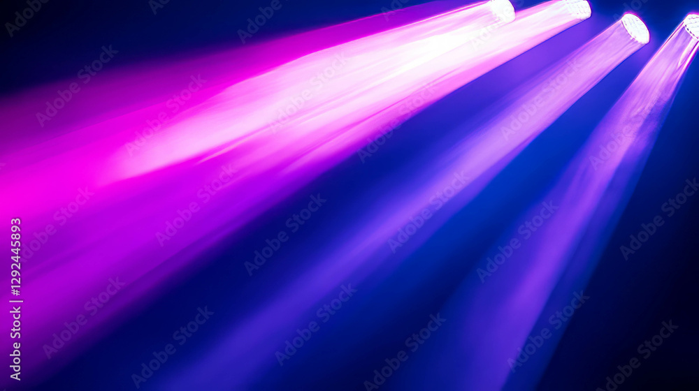 Fototapeta premium Vibrant pink and white light rays in night club or party atmosphere