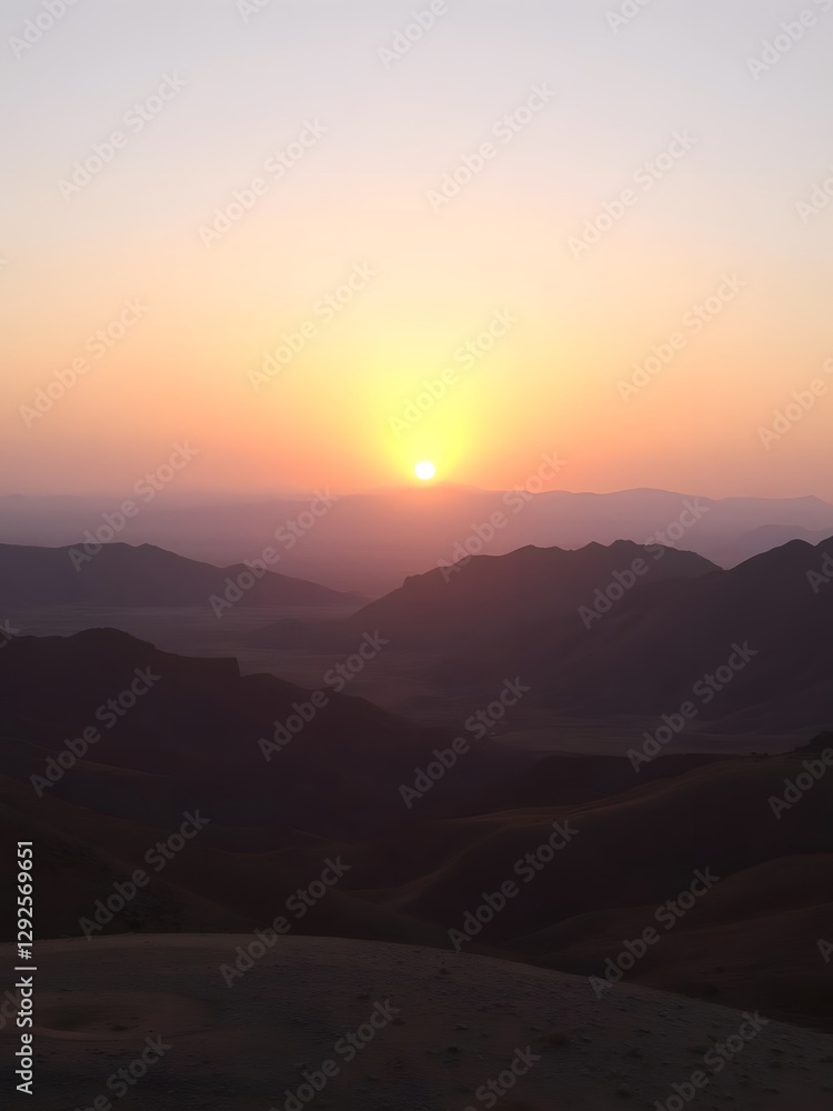 Sunset Over a Desert Valley with Rugged Hills and Soft Shadows Under a Lavender Sky Sunset Over a Desert Valley with Rugged Hills and Soft Shadows Under a Lavender Sky