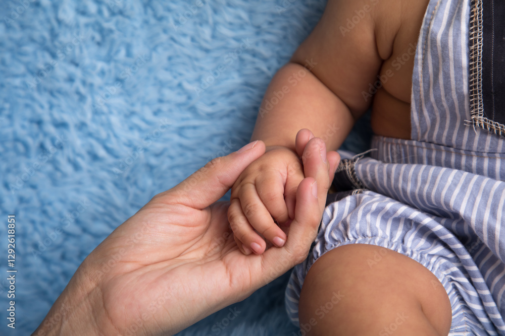 Little newborn baby hands and fingers delicate close up Little newborn baby hands and fingers delicate close up