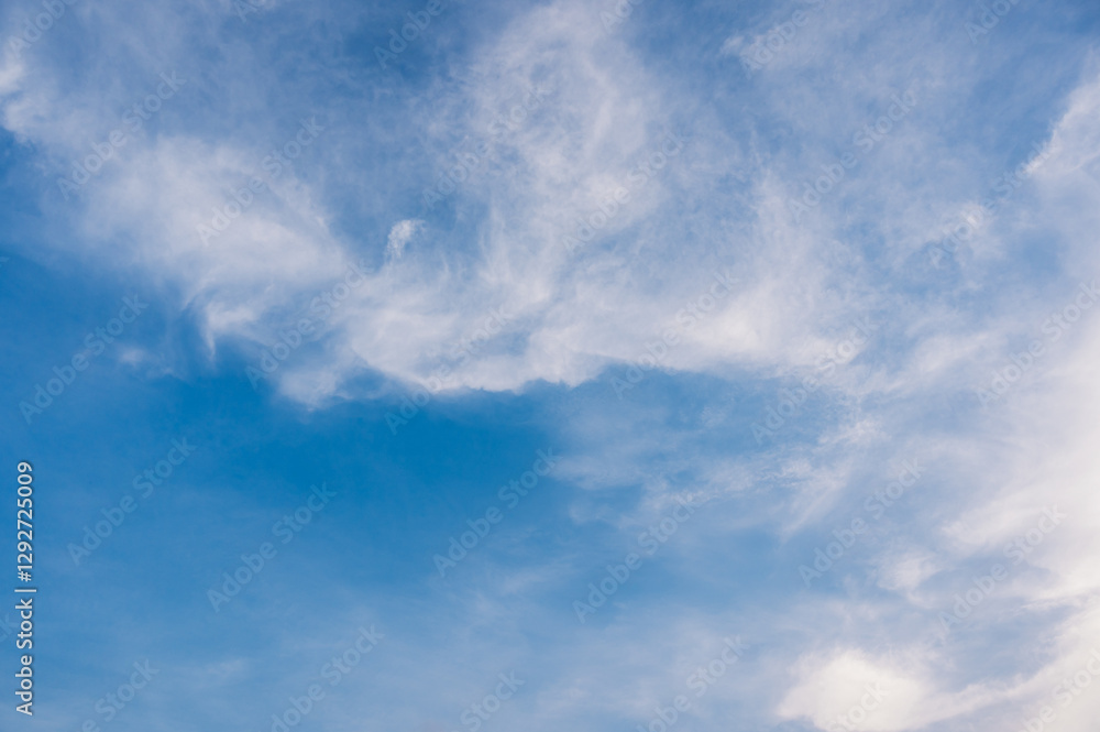 Cirrus cloud with sunset light over blue sky. nature wallpaper background. Cirrus cloud with sunset light over blue sky. nature wallpaper background.