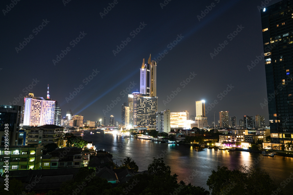 View of Bangkok, Thailand at night, showing the Chao Phraya River and boats. Taken on 22 Dec 2023. View of Bangkok, Thailand at night, showing the Chao Phraya River and boats. Taken on 22 Dec 2023.