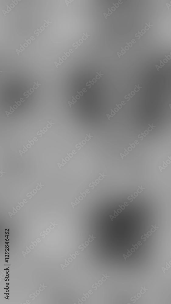 An abstract neutral black and white mottled grainy grunge texture motion graphic background loop design. An abstract neutral black and white mottled grainy grunge texture motion graphic background loop design.
