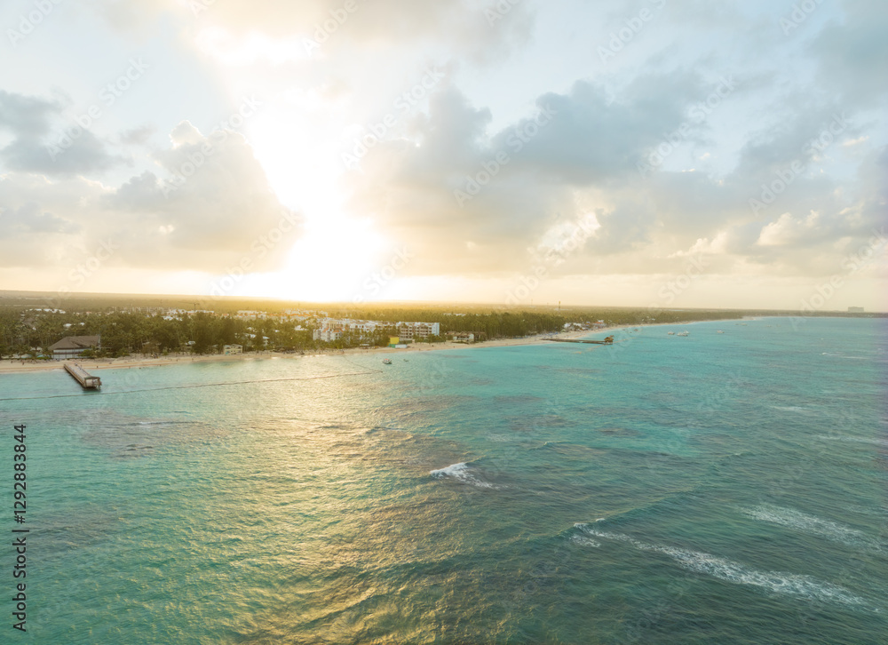 A beautiful ocean view with a sunset in the background