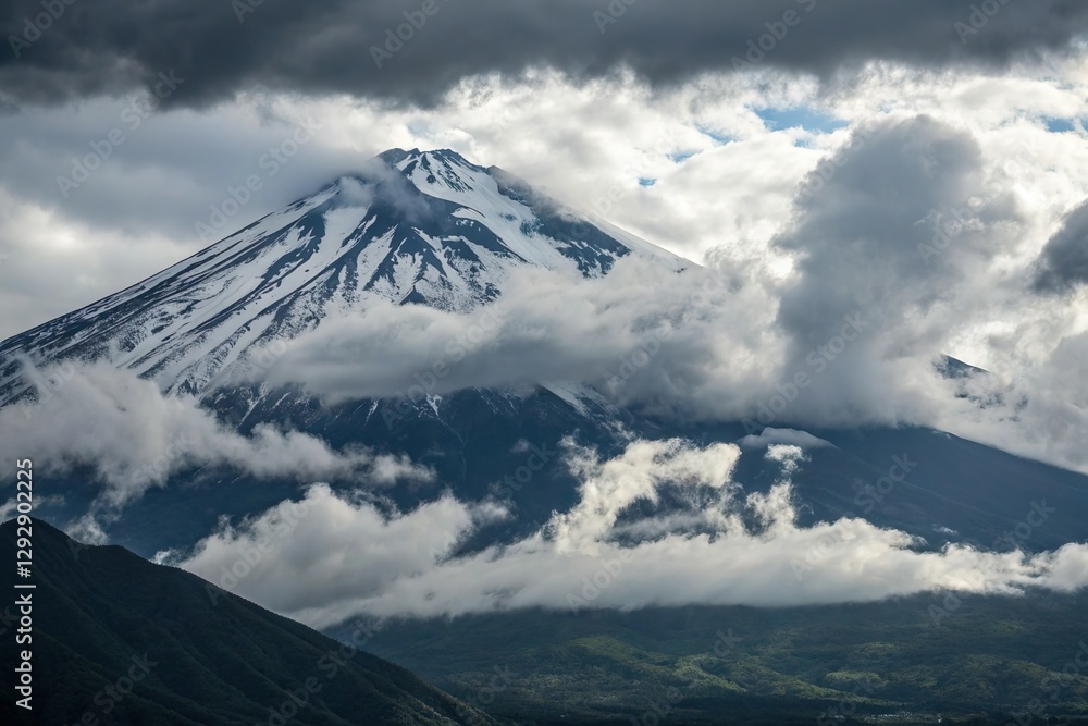 Dramatic cloud over snowy mountain. Epic peak landscape Dramatic cloud over snowy mountain. Epic peak landscape