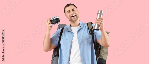 Male tourist with backpack,...