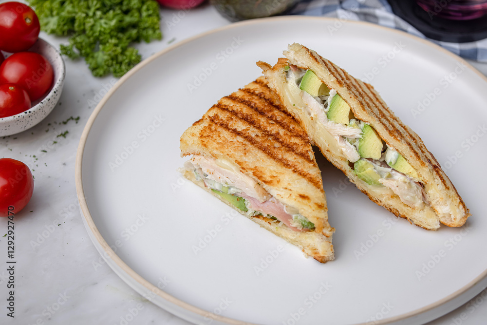 Grilled chicken avocado sandwich kitchen food photography cozy environment close-up culinary delight Grilled chicken avocado sandwich kitchen food photography cozy environment close-up culinary delight