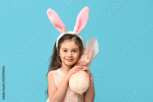Cute little girl in bunny e...