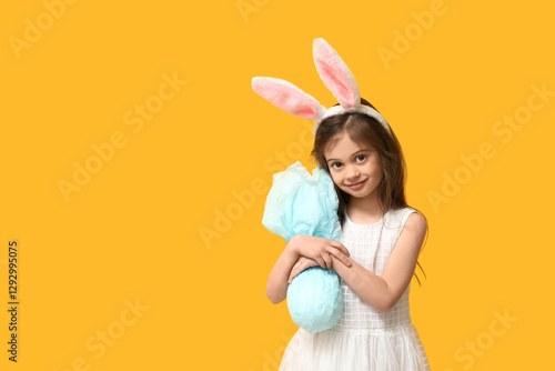 Happy little girl in bunny ...