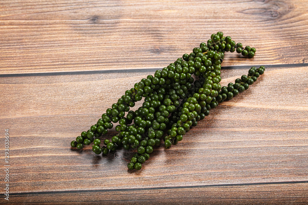 Fresh ripe green peppercon heap