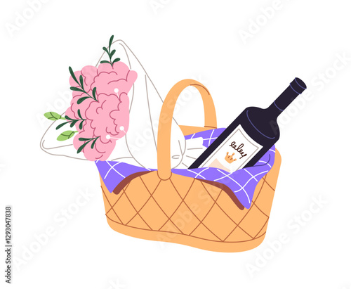 Φωτογραφία Straw basket with bloom bouquet of flowers and bottle of wine