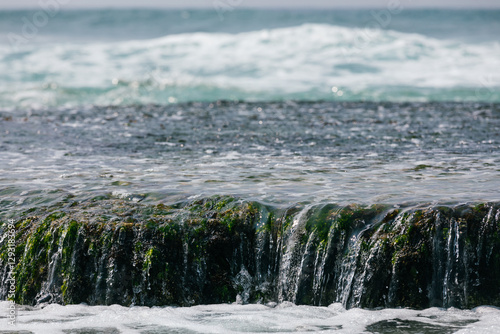 View of sea wave s borken on seaside reef photo