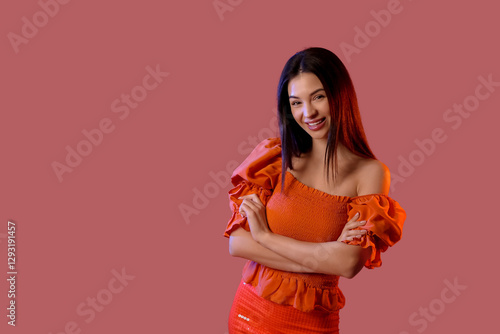 Happy young woman on red ba...