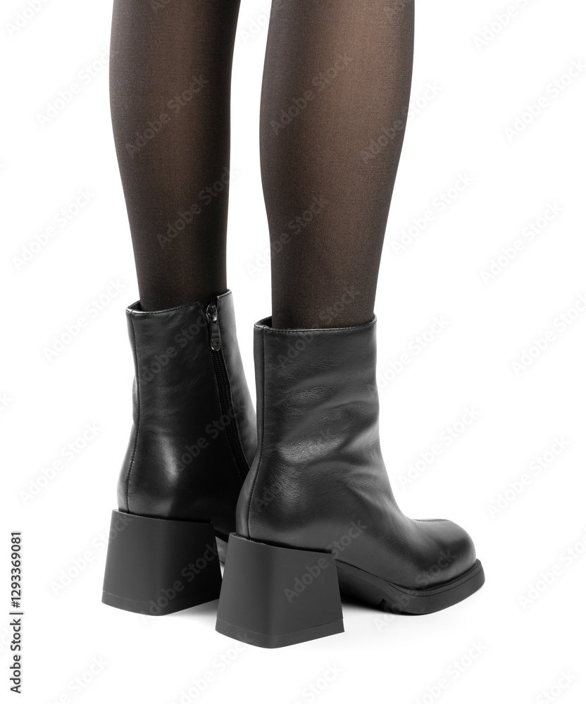 Women's shoes on a white background. Close up of a women's black leather chelsea boots on white background. Footwear for city, urban lifestyle or traveling. Concept of fashion, design and footwear. Women's shoes on a white background. Close up of a women's black leather chelsea boots on white background. Footwear for city, urban lifestyle or traveling. Concept of fashion, design and footwear.