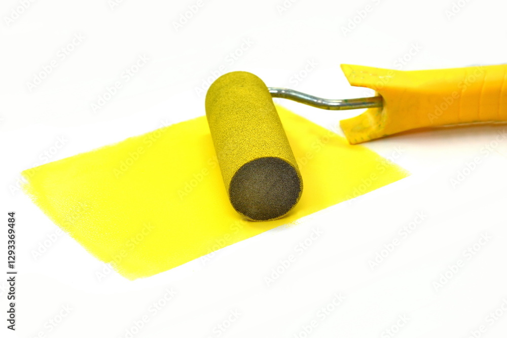 Painting a rough wall with roller. Paint roller leaving stroke of yellow color over a white background. usable for text and messages. Painting a rough wall with roller. Paint roller leaving stroke of yellow color over a white background. usable for text and messages.
