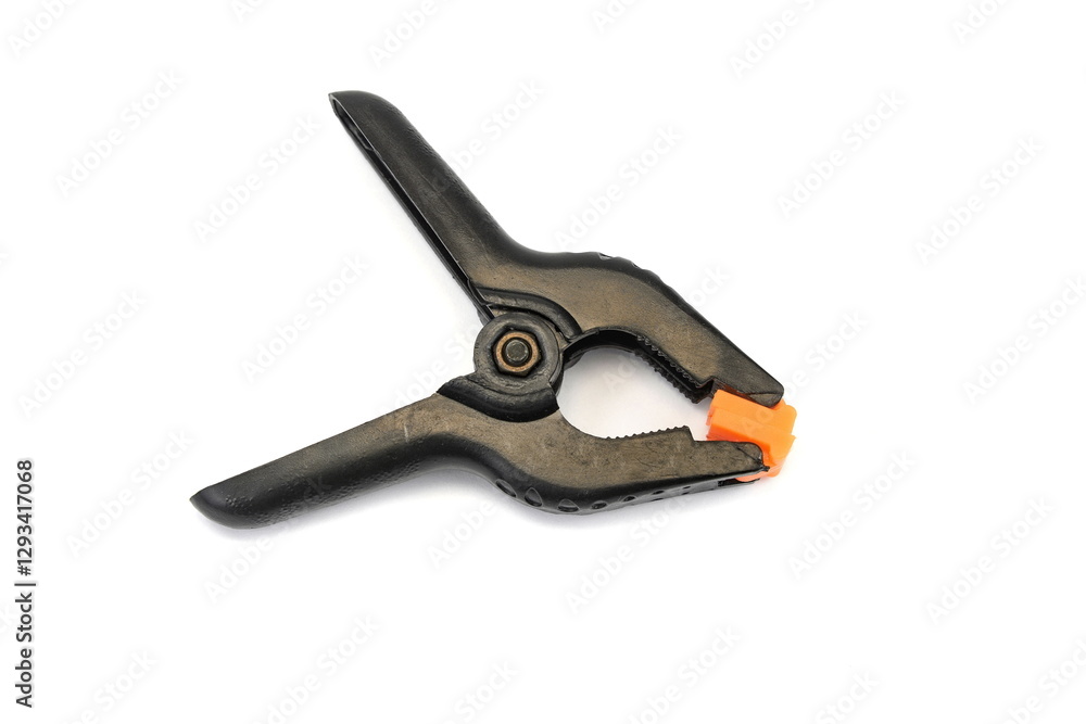 Black plastic clamp, isolated on a white background. Black plastic clamp, isolated on a white background.