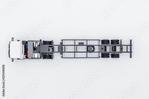 Obraz na płótnie Top view white truck with cargo semi trailer on white background, The top view of transport semi truck trailer, Business logistic and transportation by semi truck trailer. w salonie