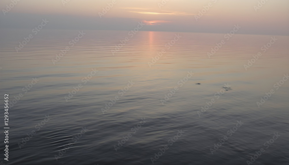 Fototapeta premium Tranquil Lake with Soft Pastel Sunset Reflections