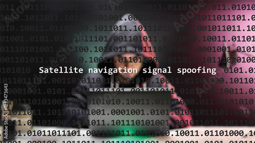 Cyber attack satellite navigation signal spoofing text in foreground screen, anonymous hacker hidden with hoodie in the blurred background. Vulnerability text in binary system code on editor program.