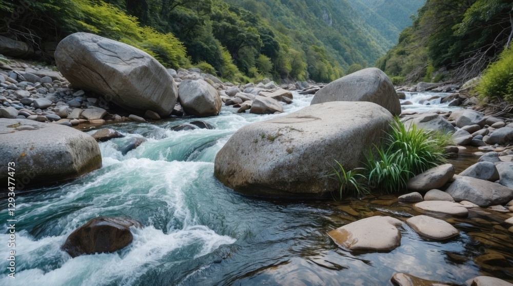 Serene mountain creek with large boulders and rapid water flow surrounded by lush vegetation and smooth stones in natural landscape scene. Serene mountain creek with large boulders and rapid water flow surrounded by lush vegetation and smooth stones in natural landscape scene.