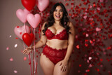 portrait of a beautiful woman in lingerie on a body with hearts bokeh