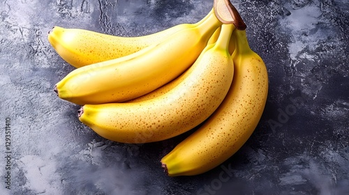 Fresh Bunch of Ripe Yellow Bananas on Dark Background