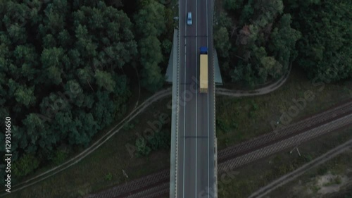Truck on highway in twilight, aerial view