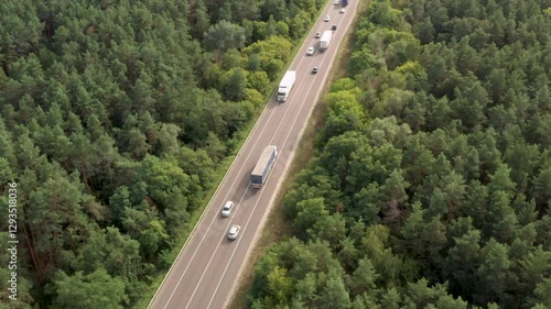 Traffic on highway on summer afternoon, aerial view