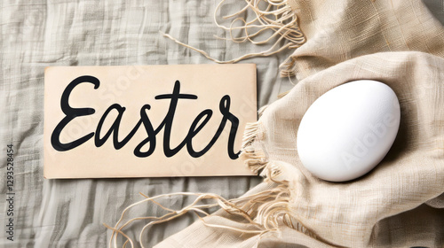 Rustic Easter Decor with White Egg and Handwritten Sign on Fabric