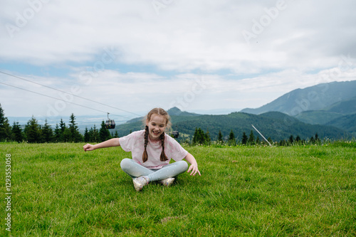 Girl enjoying Bachledka Ski Sun in Slovakia with mountain views photo