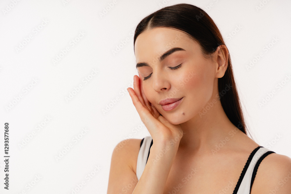 Person with closed eyes meditating or enjoying a calm moment, conveying serenity and relaxation. Person with closed eyes meditating or enjoying a calm moment, conveying serenity and relaxation.