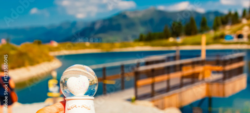 Photography Crystal ball, with a heart inside, alpine summer landscape shot at Mount Ahorn,