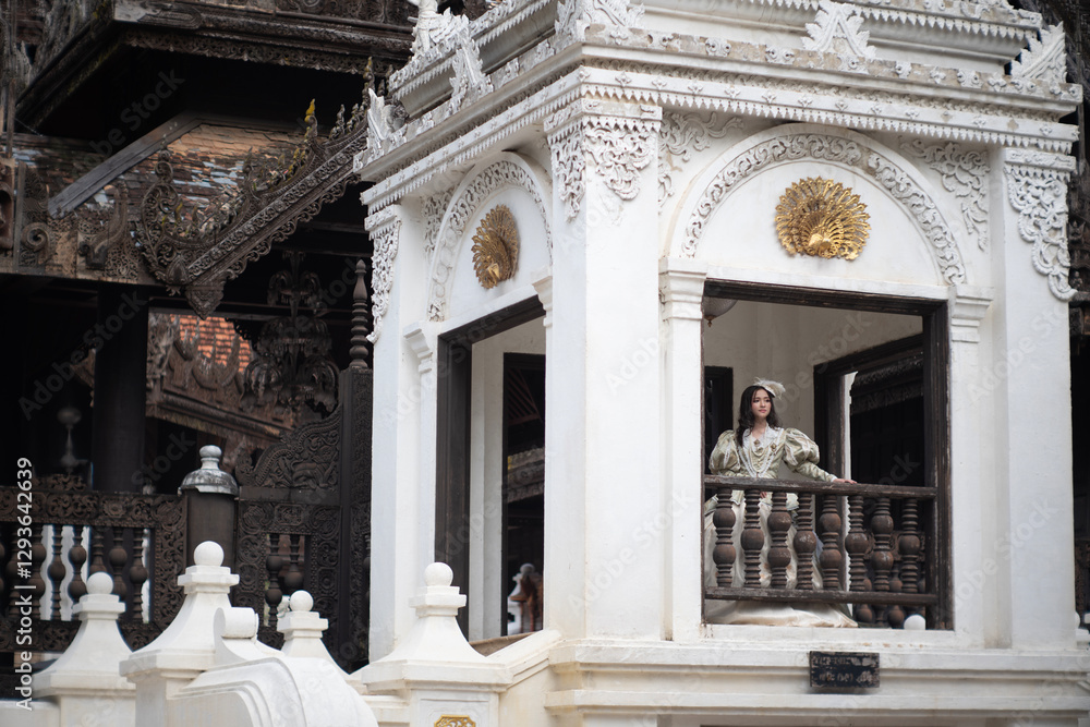 Beautiful young woman wearing vintage clothes in a beautiful old place.