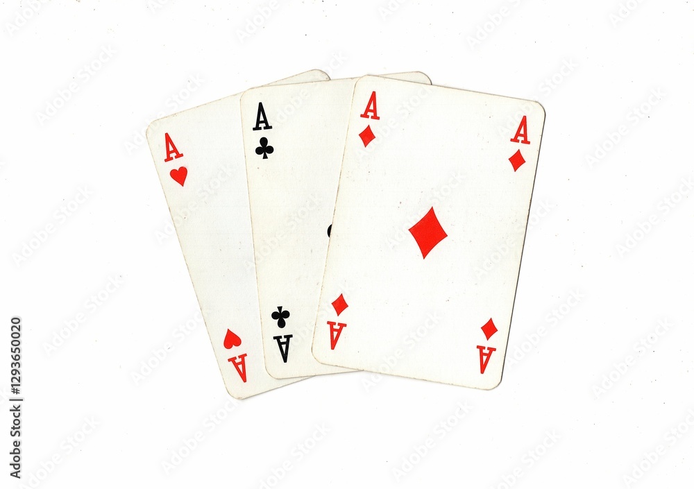 Obraz premium A hand of vintage playing cards isolated on a white background.