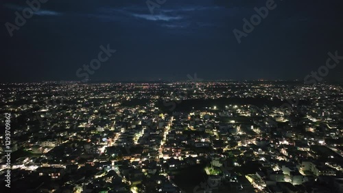Wallpaper Mural An aerial view of Dehradun, a smart Indian city. The top-angle views of the city's residential houses in Dehradun, Uttarakhand, India. A beautiful city in India at night. Torontodigital.ca
