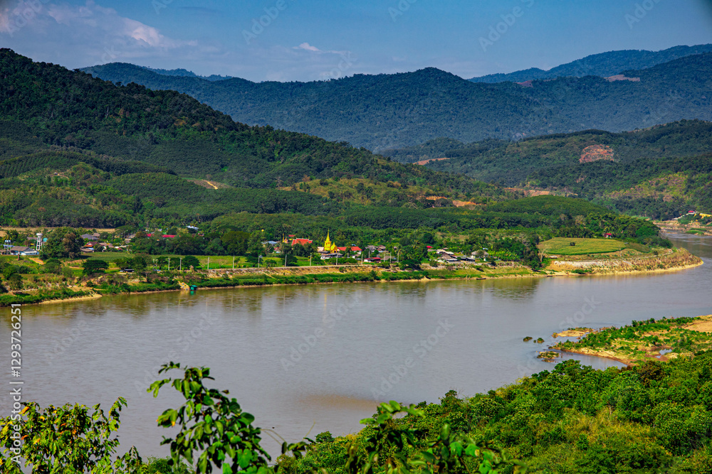 Aerial view of the high mountains and the Mekong River, is nestled in the high mountains and tropical rainforest. Aerial view of the high mountains and the Mekong River, is nestled in the high mountains and tropical rainforest.