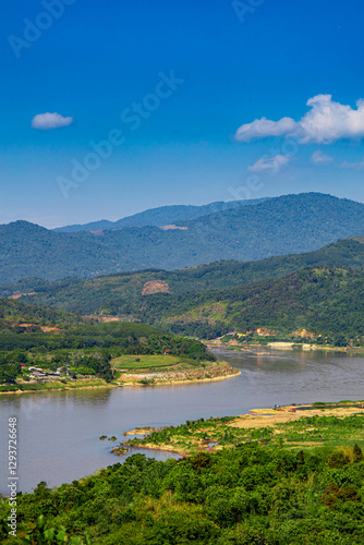 Aerial view of the high mountains and the Mekong River, is nestled in the high mountains and tropical rainforest.