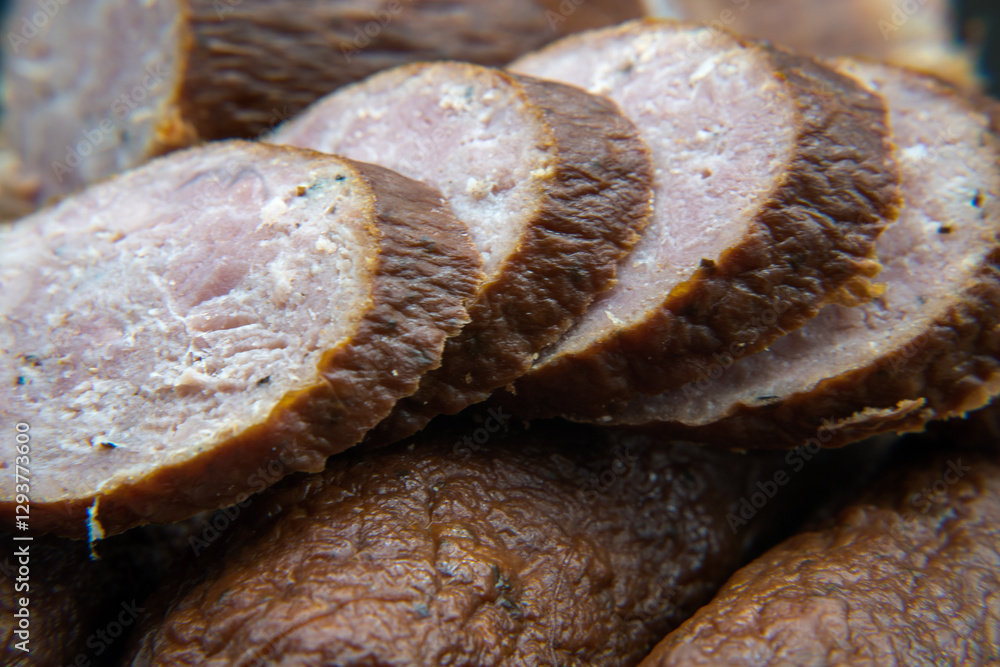 Dry smoked sausage, medium minced. Traditional taste and appetizing aroma.