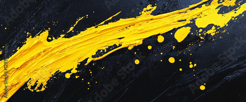 Close-up of yellow paint strokes and splatters on a dark canvas background, showcasing an abstract, dynamic, and artistic composition of vibrant yellow paint. photo