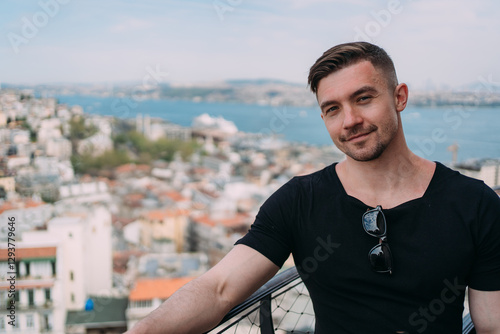 Bild auf Leinwand A man on the background of the city of Istanbul