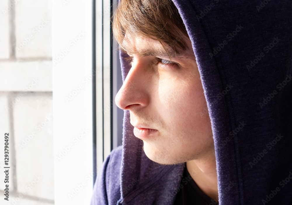 Sad Man near the Window