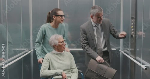 Diverse people talking in the elevator