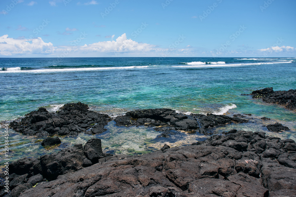 Stunning beach view featuring the turquoise waters of the Indian Ocean in Mauritius Stunning beach view featuring the turquoise waters of the Indian Ocean in Mauritius