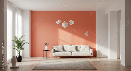 A minimalist living room features a coral accent wall, a white sofa, a stylish floor lamp, a modern chandelier, and a neutral rug on a herringbone wood floor. 