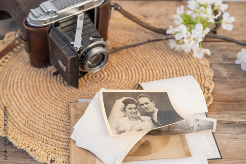 Antique sepia-toned wedding portrait encapsulates timeless love and commitment young European couple on wooden table, cherished memories, timeless wedding traditions photo