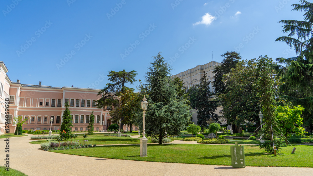 Obraz premium Walking yard of harem in courtyard of Dolmabahсe Palace in Istanbul, Turkey, on European coast of Bosporus strait, main administrative center of Ottoman Empire