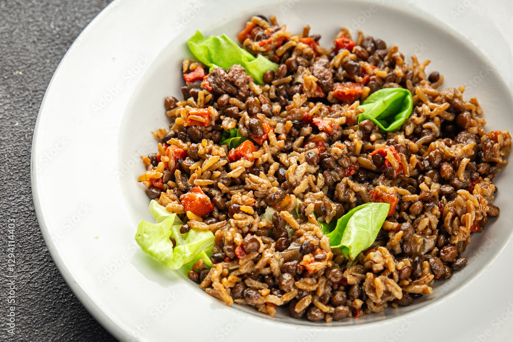 Rice lentil and vegetables snack fresh tasty food dish vegetarian vegan food no meat delicious gourmet food background on the table rustic food top view copy space keto and paleo diet Rice lentil and vegetables snack fresh tasty food dish vegetarian vegan food no meat delicious gourmet food background on the table rustic food top view copy space keto and paleo diet